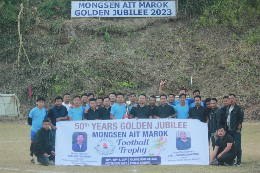 Player of Gilgal FC along with the trophy and the organizing team at Longjang local ground, Mokokchung on December 20. (Photo Credit: Mongsen Ait Club)